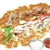 Turkse pizza met kaas, kipdöner en groente